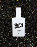 The Sixth Scent Midnight Opium perfume bottle with dark, elegant design and floral accents, showcasing a luxurious fragrance.