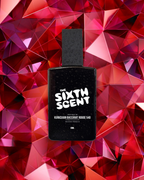 The Sixth Scent Rouge Elite perfume bottle with sleek red and gold design, showcasing a luxurious fragrance.