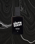 A bottle of NOMAD OUD perfume by The Sixth Scent, showcasing its elegant design and luxurious fragrance packaging.